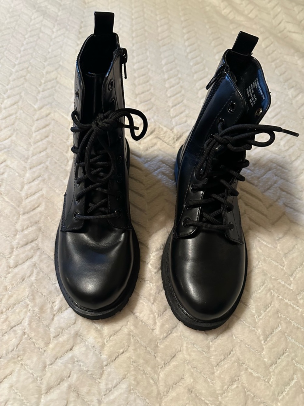 Woman’s size 6.5 black combat boots NEW
